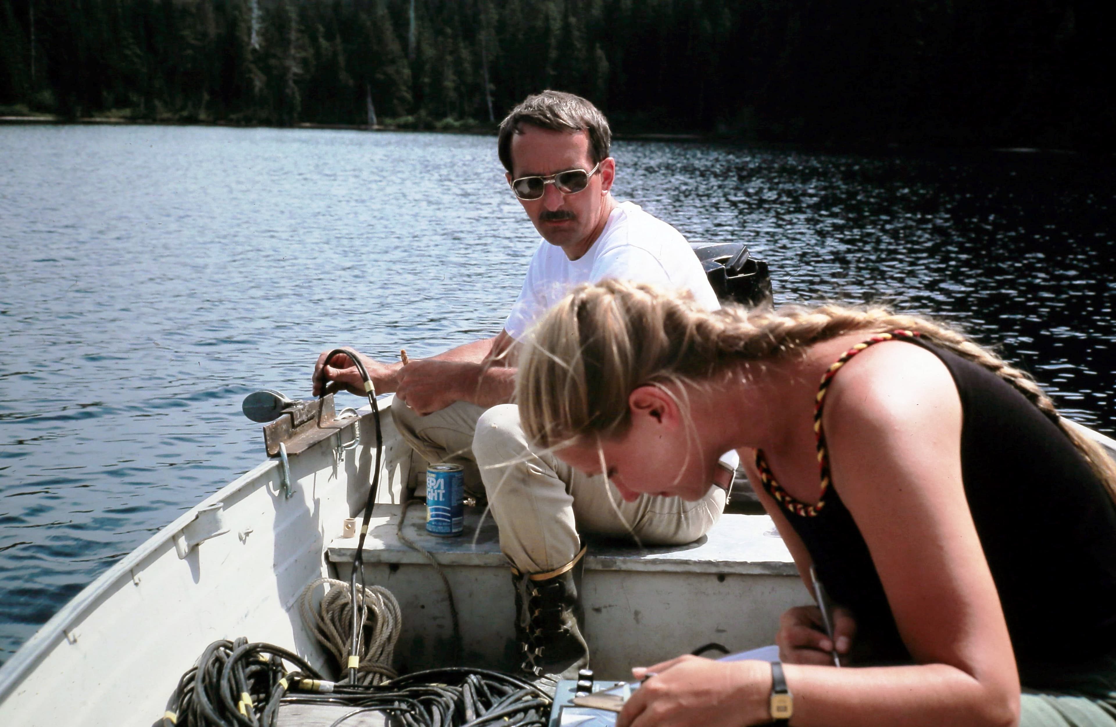 July 20, 1982 - N.P. Dion and S.S. Embrey reading Dissolved Oxygen levels at Deadmans Lake, 12.7 miles NNE of the vent and just beyond the blast zone. Deadmans served as the control in the lakes study. USGS S.S. Embrey